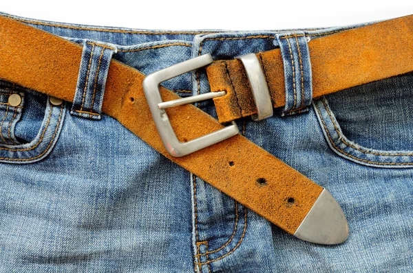 Blue jeans and leather belt — Stock Photo, Image