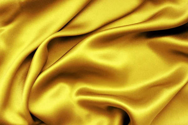 Golden silk textile background — Stock Photo, Image