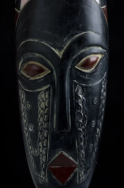 African mask over black background — Stock Photo, Image