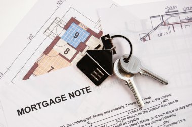 Keys on mortgage note clipart