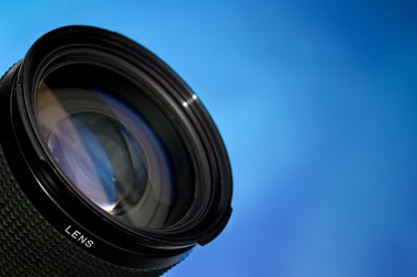 Photography lens over blue clipart