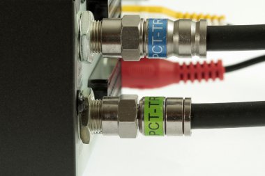 Coaxial cables connected to LNB inputs clipart