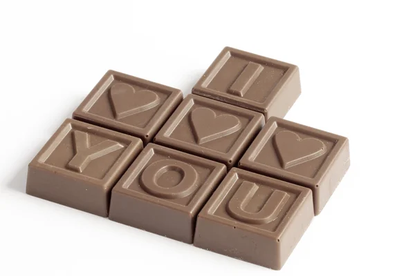 Woorden ik hou van je gemaakt van kleine chocolat — Stockfoto