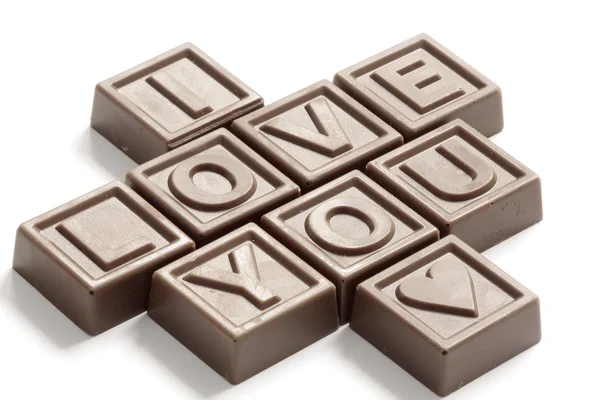 Palabra Amor hecho de pequeños chocolates — Foto de Stock
