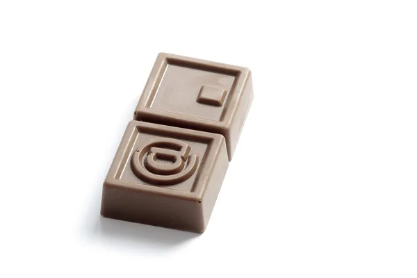 Em e sinal de ponto em chocolate — Fotografia de Stock
