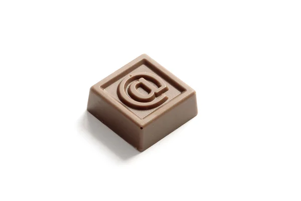 At sign made in chocolate — Stock Photo, Image