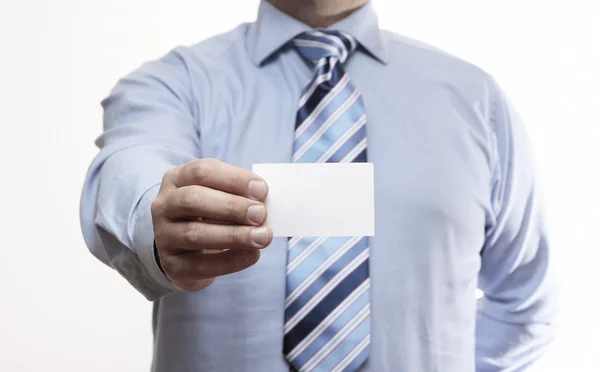 Businessman holding a business card. — Stock Photo, Image