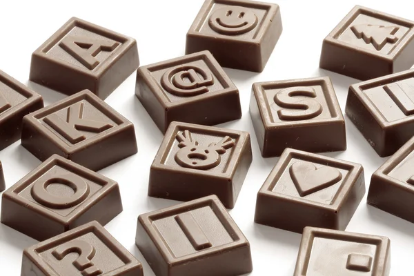 Um monte de chocolates doces — Fotografia de Stock