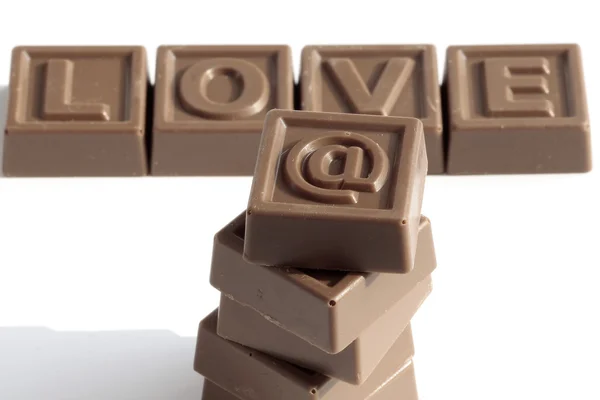 Word love made of sweet chocolate — Stock Photo, Image