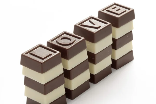 Towers of love made from chocolates — Stock Photo, Image