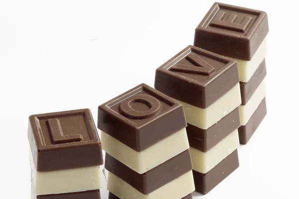 Word love made of sweet chocolate — Stock Photo, Image
