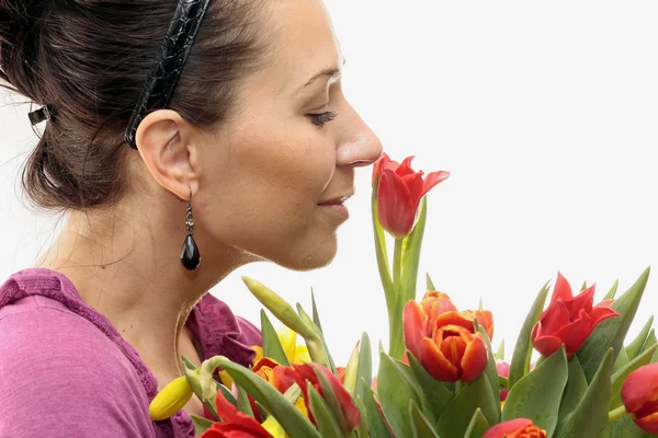 Mujer con tulipanes de colores —  Fotos de Stock