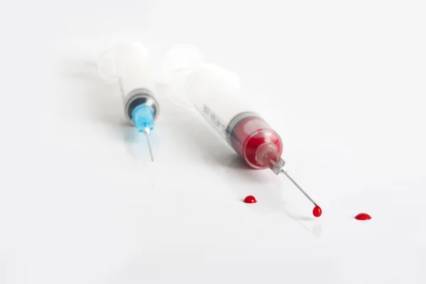 Syringe with blood Stock Picture