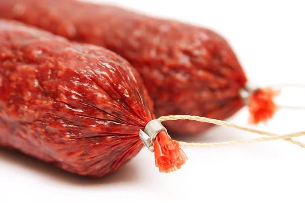 stock image Smoked sausage is isolated