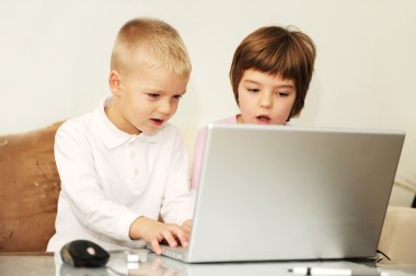 Two happy children playing games  clipart