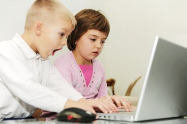 Two happy children playing games  clipart