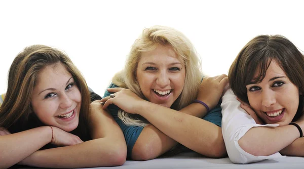 Drie jonge meisjes geïsoleerd op wit — Stockfoto