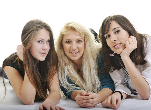 Három fiatal lány, elszigetelt fehér — Stock Fotó