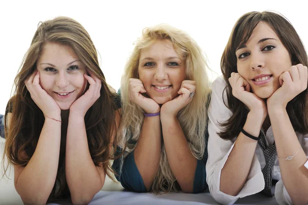 Tres chicas jóvenes aisladas en blanco —  Fotos de Stock