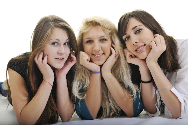 Üç genç kız üzerinde beyaz izole — Stok fotoğraf