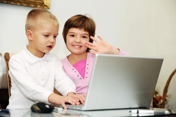 Two happy children playing games — Stock Photo, Image