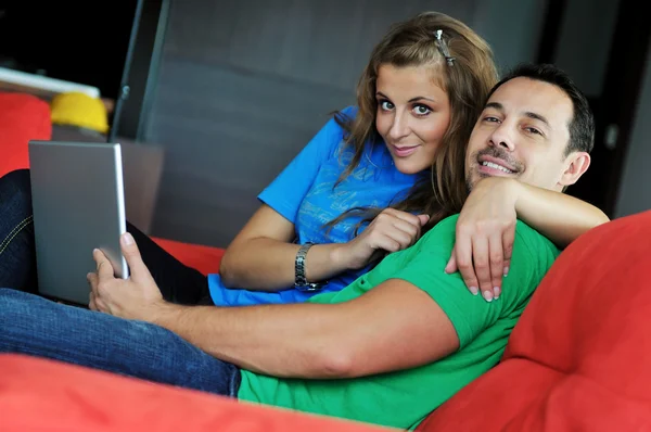 Couple have fun on laptop at home — Stock Photo, Image