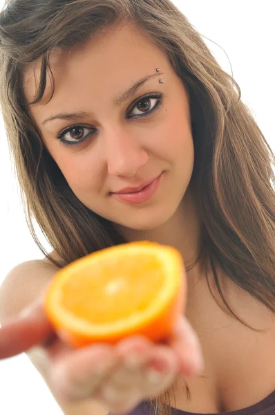 Woman isolated on white hold orange — ストック写真