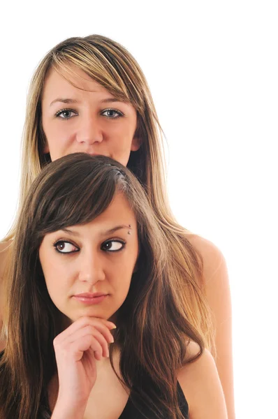 Två unga flickor isolerad på vit — Stockfoto