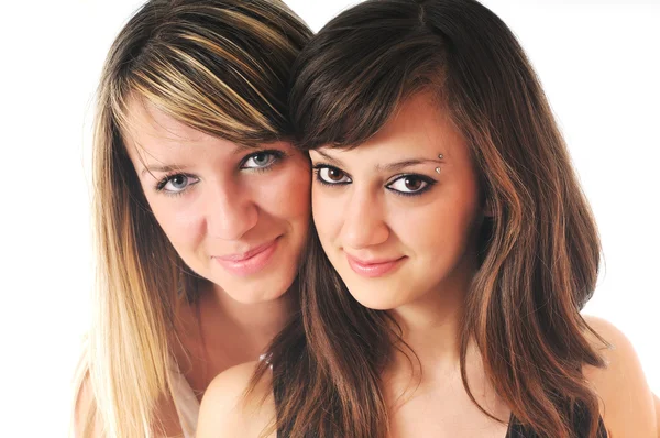Duas meninas jovens isoladas em branco — Fotografia de Stock