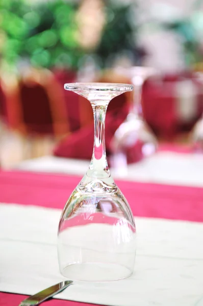 Restaurant table with empty wine glass — Stock Photo, Image