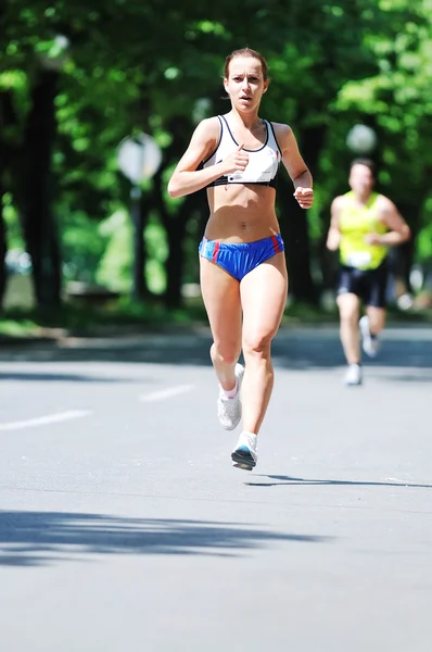 Maratona mulher correr — Fotografia de Stock