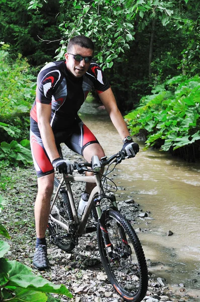 Wet mount bike ride — Stock Photo, Image