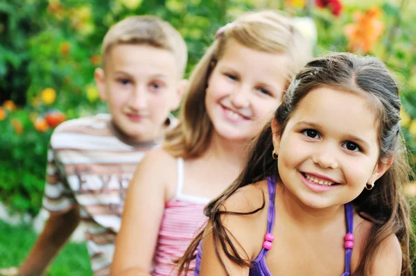 Happy kids outdoor Stock Image