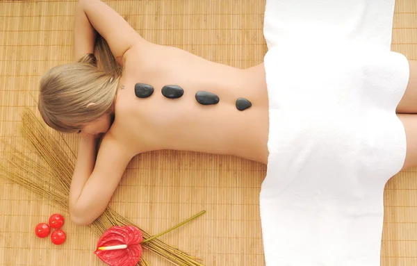 Massage with hot volcanic stones — Stock Photo, Image