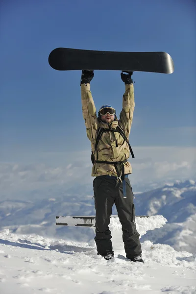 Freestyle snowboarder skok a jízda — Stock fotografie