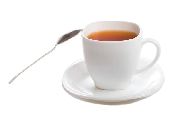 Чашка чая с руибосом крупным планом с ложкой — стоковое фото