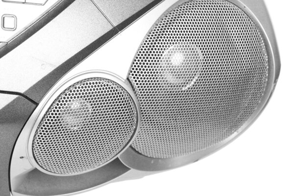 Close-up speakers of tape recorder, isolated on white