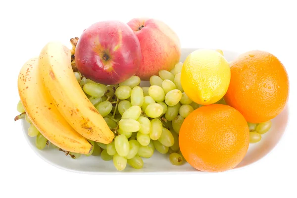 Früchte auf dem Teller — Stockfoto