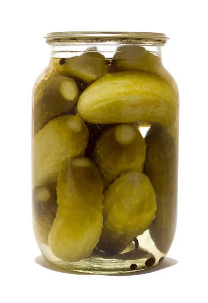 Glass jar with preserved cucumbers — Stock Photo, Image