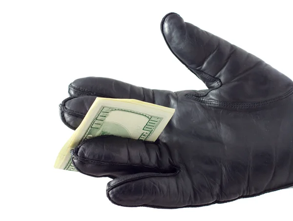 stock image Hand in glove give dollars
