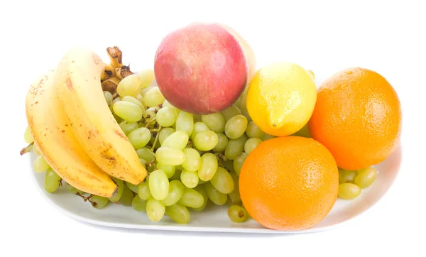 Багато фруктів на тарілці — стокове фото