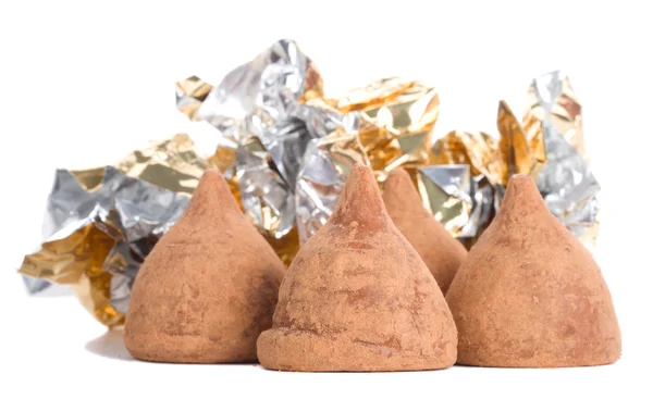 Truffles and foil — Stock Photo, Image