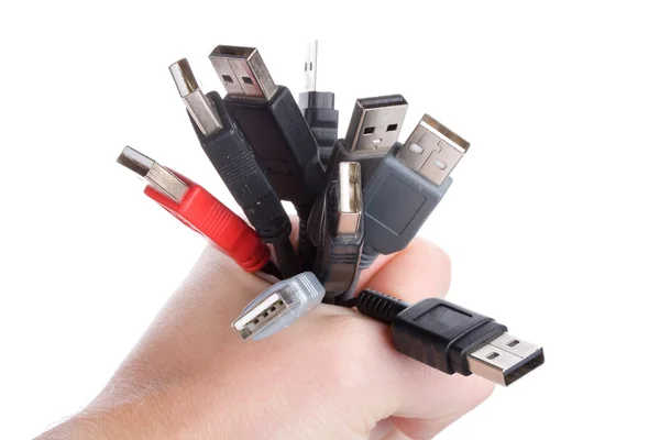 Cables USB en la mano —  Fotos de Stock