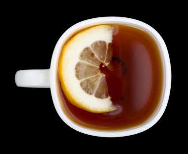 Cup of tea with lemon on black clipart