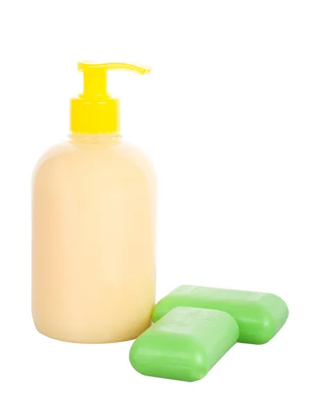 Liquid soap and two bars of toilet soap — Stock Photo, Image
