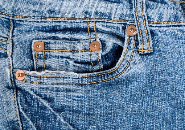 Oude blauwe spijkerbroek textuur met zak — Stockfoto