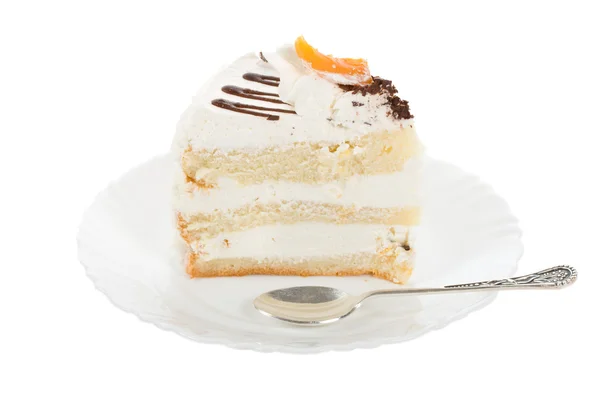 Кусок торта с ложкой — стоковое фото