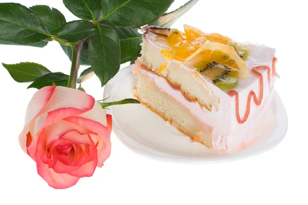 Piece of cake and rose — Stock Photo, Image