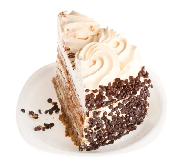 Pedazo de pastel en plato blanco — Foto de Stock