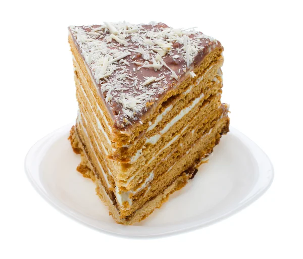 Pedaço de bolo de mel caseiro no prato — Fotografia de Stock